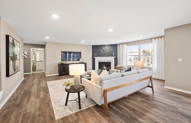 living room with dark hardwood / wood-style floors