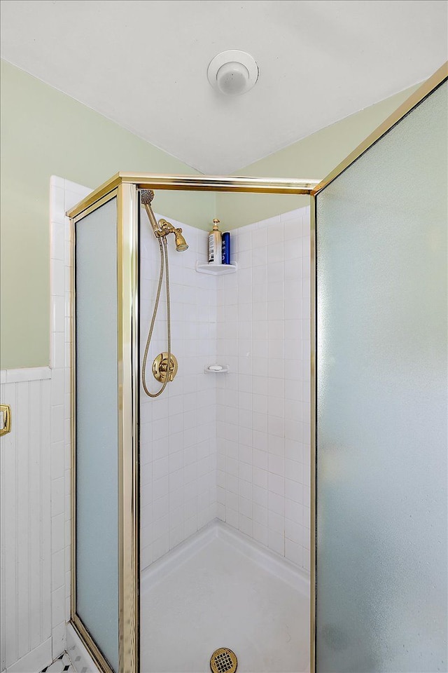 bathroom featuring an enclosed shower