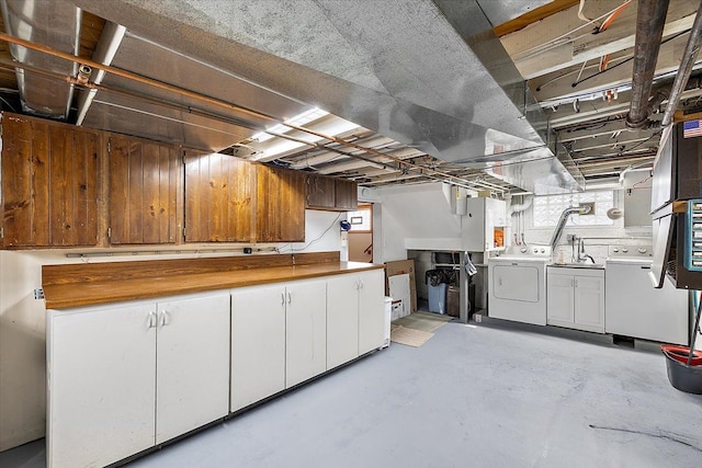 basement with washing machine and dryer