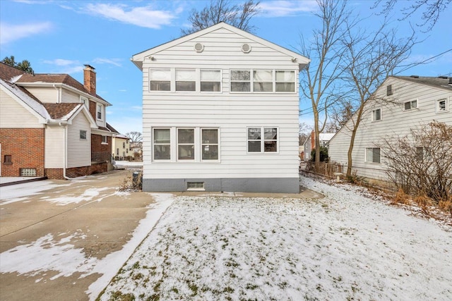 view of snow covered property