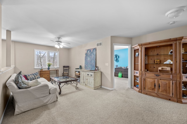 3700 Marie Meadows Dr, White Lake, MI 48383 - living area featuring carpet floors, ceiling fan, and baseboards
