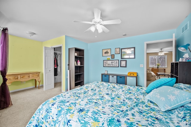 3700 Marie Meadows Dr, White Lake, MI 48383 - carpeted bedroom with ceiling fan, baseboards, a closet, and a spacious closet