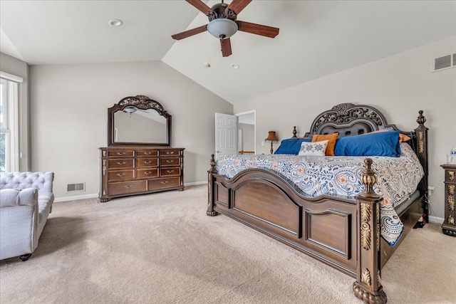 bedroom with lofted ceiling, light colored carpet, and ceiling fan