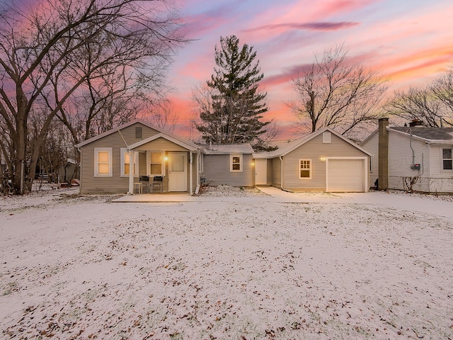 single story home featuring covered porch