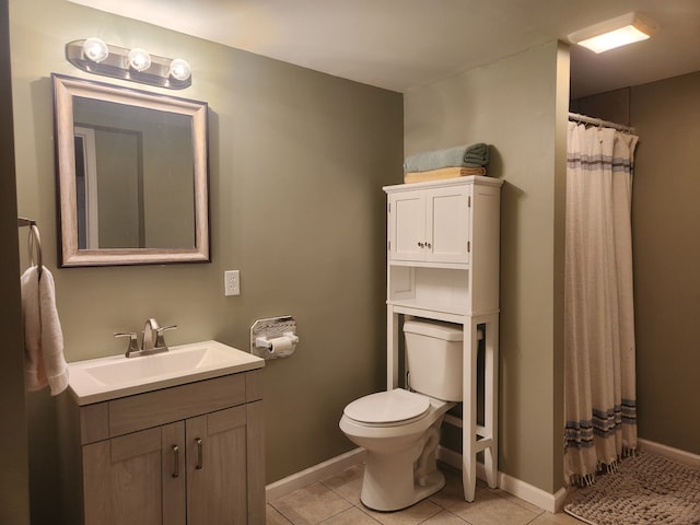 bathroom featuring tile patterned flooring, vanity, toilet, and a shower with curtain