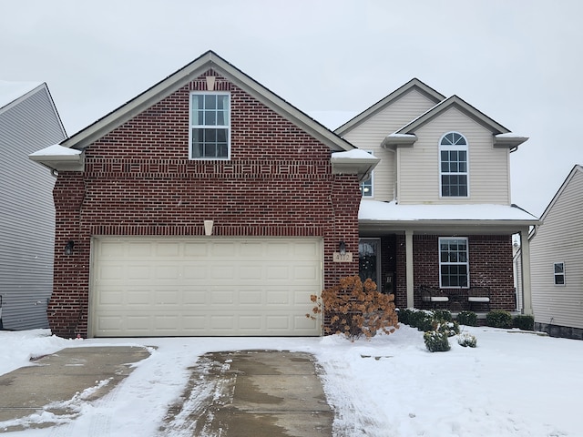 front of property with a garage