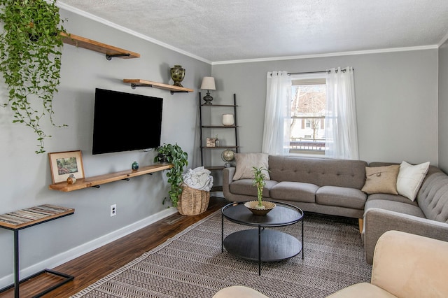 living room with a textured ceiling, ornamental molding, and dark wood-type flooring