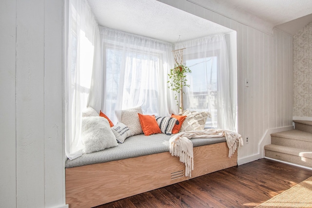 sitting room featuring dark wood-type flooring