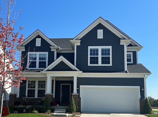 craftsman house with a garage