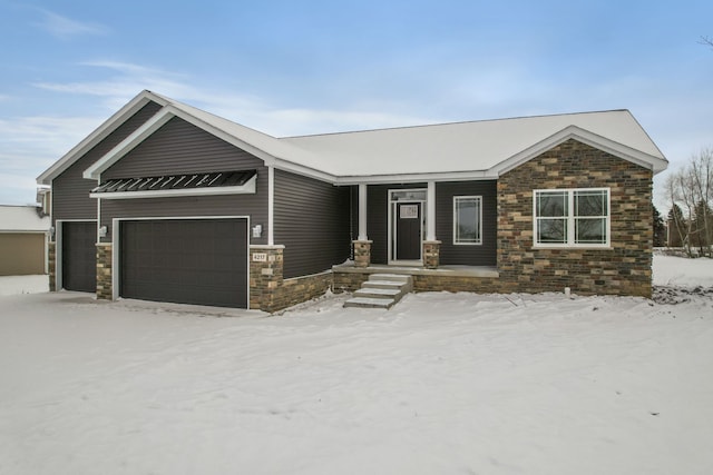 view of front of property with a garage