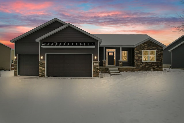 view of front of property with a garage