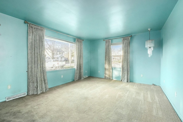 empty room with carpet flooring