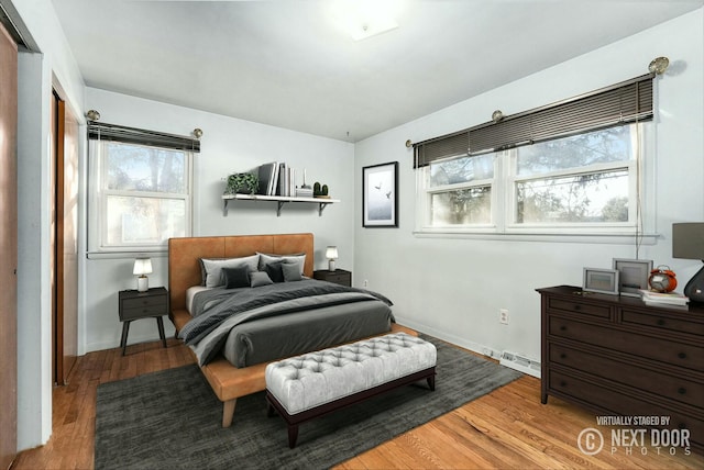 bedroom with light hardwood / wood-style flooring