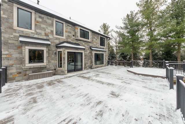 view of snow covered deck