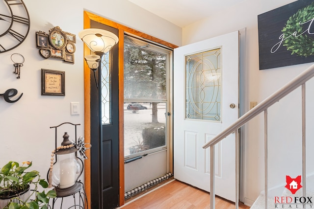 foyer with light hardwood / wood-style flooring