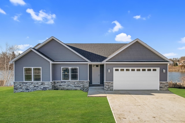 craftsman inspired home with a garage and a front yard