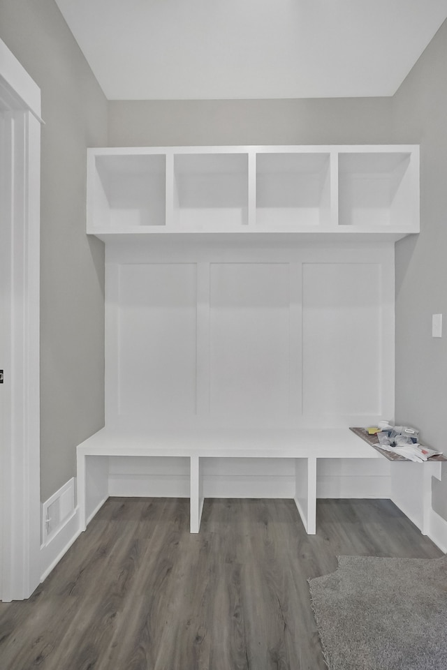 mudroom with dark wood-type flooring