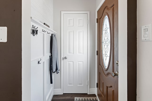 interior space featuring dark hardwood / wood-style flooring and a healthy amount of sunlight