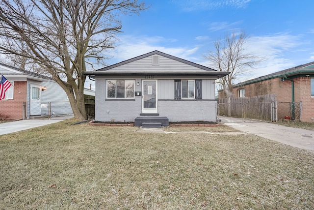 bungalow with a front yard