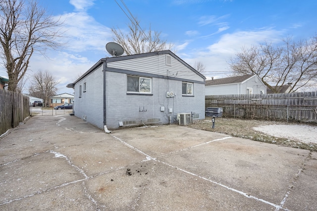 back of property with cooling unit