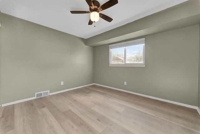 unfurnished room featuring ceiling fan and light wood-type flooring