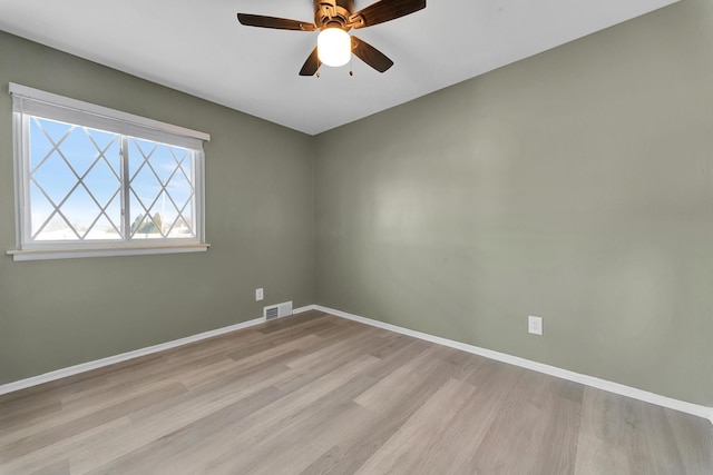 unfurnished room with ceiling fan and light hardwood / wood-style floors