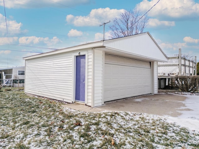 view of snow covered garage