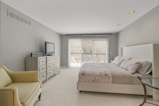 bedroom with light carpet