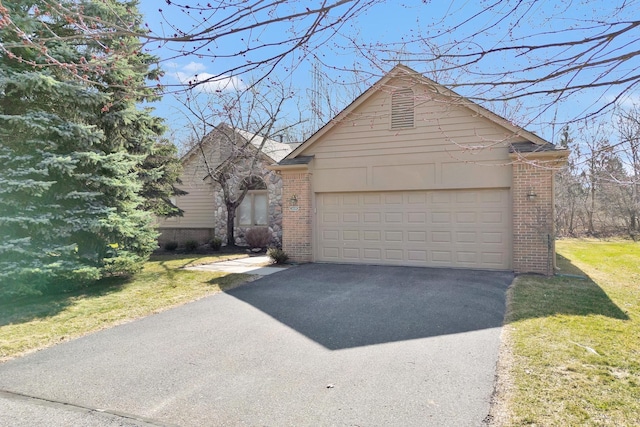 5059 Pheasant Cv, West Bloomfield, MI 48323 - view of front of home featuring aphalt driveway, brick siding, a garage, an outbuilding, and a front yard