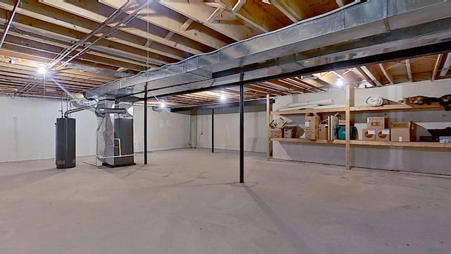 5059 Pheasant Cv, West Bloomfield, MI 48323 - unfinished basement featuring water heater and heating unit