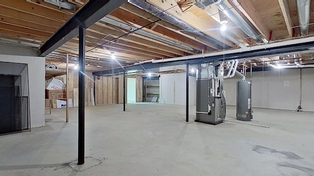 5059 Pheasant Cv, West Bloomfield, MI 48323 - unfinished basement with gas water heater and heating unit