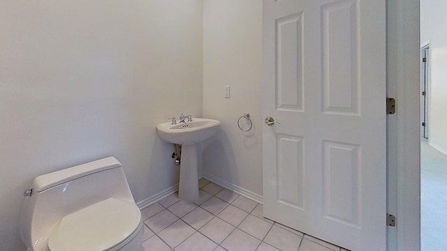 5059 Pheasant Cv, West Bloomfield, MI 48323 - half bath with toilet, baseboards, and tile patterned floors
