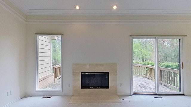 5059 Pheasant Cv, West Bloomfield, MI 48323 - doorway to outside with crown molding, visible vents, a premium fireplace, and carpet