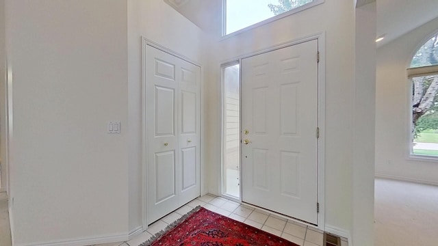 5059 Pheasant Cv, West Bloomfield, MI 48323 - entryway featuring light tile patterned floors and baseboards