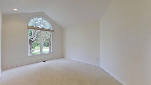5059 Pheasant Cv, West Bloomfield, MI 48323 - unfurnished room featuring carpet, vaulted ceiling, baseboards, and visible vents