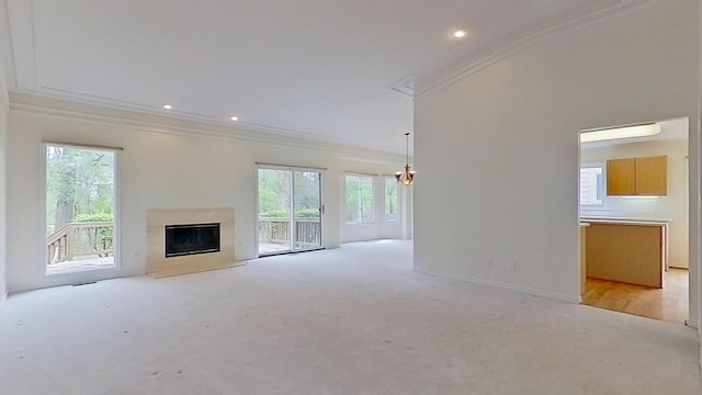 5059 Pheasant Cv, West Bloomfield, MI 48323 - unfurnished living room with light colored carpet, crown molding, a notable chandelier, and a high end fireplace