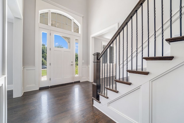 entrance foyer featuring dark hardwood / wood-style floors