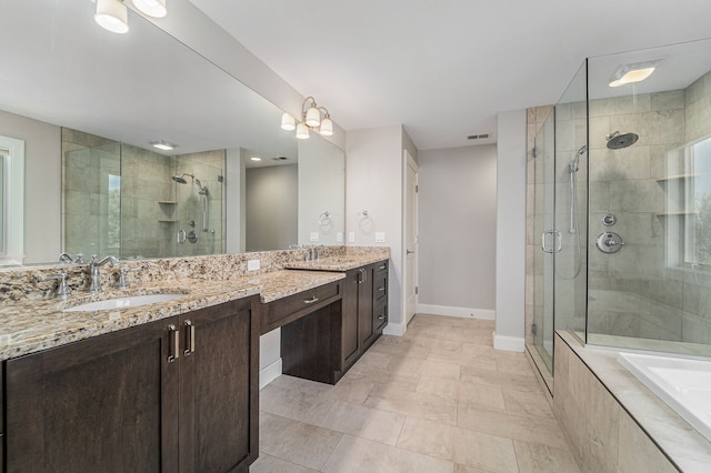 bathroom with plus walk in shower, vanity, and a notable chandelier