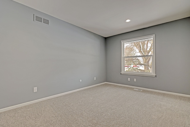 view of carpeted spare room