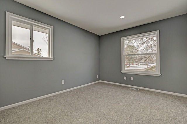 view of carpeted spare room