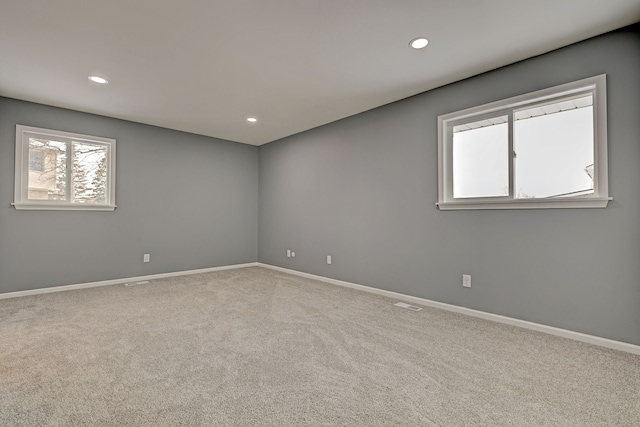 view of carpeted spare room