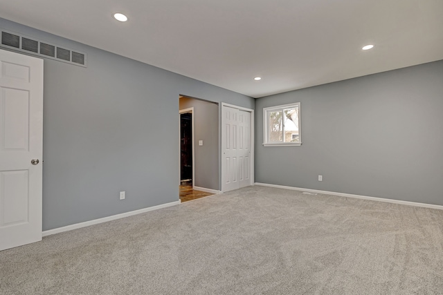 view of carpeted spare room