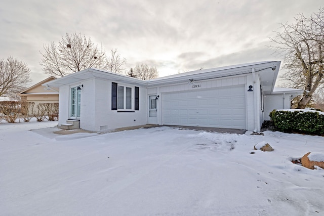 view of front of home featuring a garage