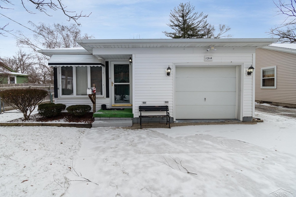 view of front of home featuring a garage