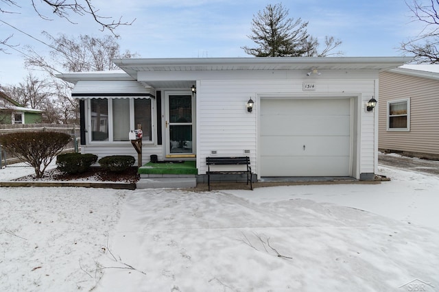 view of front of home featuring a garage