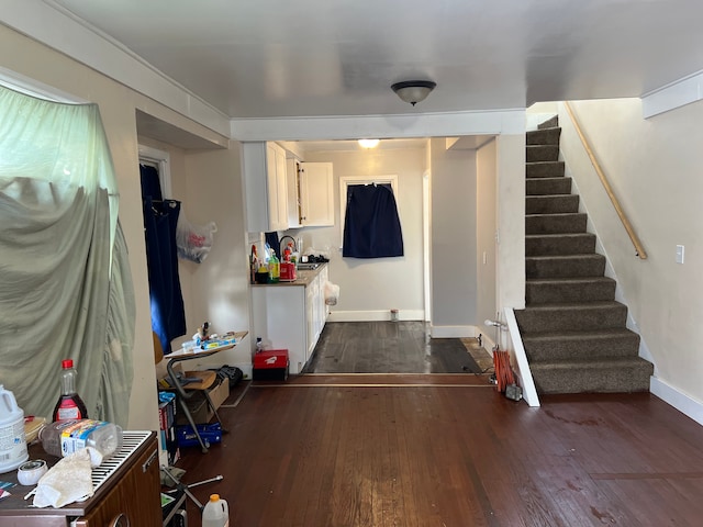 interior space with dark hardwood / wood-style floors and sink