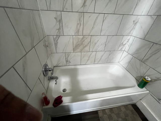 bathroom with shower / bathtub combination