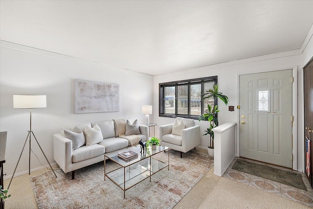 living room with plenty of natural light, light colored carpet, and crown molding