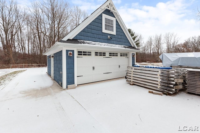 view of snow covered garage