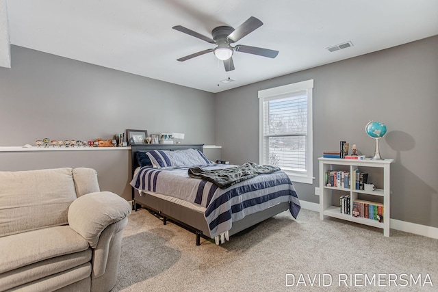 bedroom with ceiling fan and carpet flooring